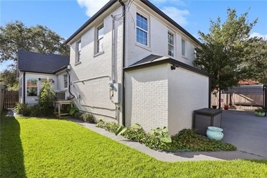 Thoughtfully renovated in 2021, this Canal Blvd residence blends - photo 30