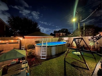 Thoughtfully renovated in 2021, this Canal Blvd residence blends - photo 32