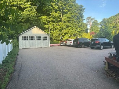 Welcome to this well-maintained 3 family home + 2 car garage - photo 19