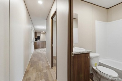 Brand-new mobile home on a spacious lot! Enjoy the perfect blend - photo 6