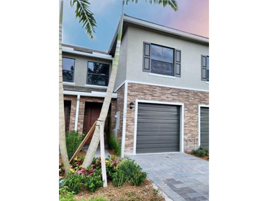 This newly built 3-bedroom, 2.5-bathroom townhouse is ideally - photo 1