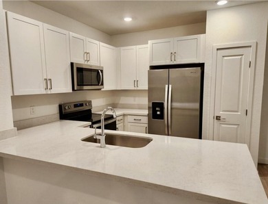 This newly built 3-bedroom, 2.5-bathroom townhouse is ideally - photo 4