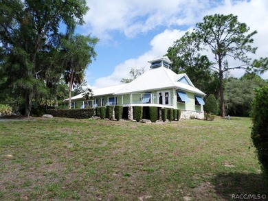 Situated centrally within the Rainbow Springs Community, this - photo 1