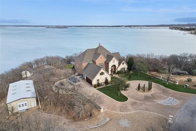 Set on 2.12 acres along the shores of Lake Bridgeport, this