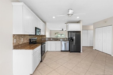 Welcome to this well-appointed two-bedroom, two-bathroom - photo 9