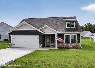 Beautifully maintained home in one of Diamondhead's newest - photo 1