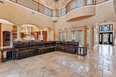 Enter through a grand entry with striking iron doors opening - photo 3