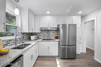 Welcome home to this inviting 3-bedroom, 2-bath pool home - photo 6