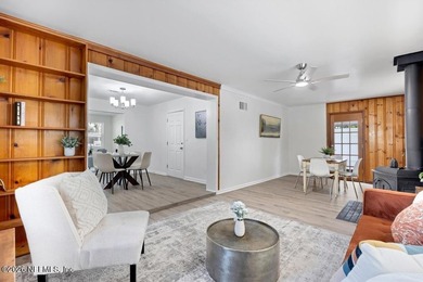 Welcome home to this inviting 3-bedroom, 2-bath pool home - photo 9