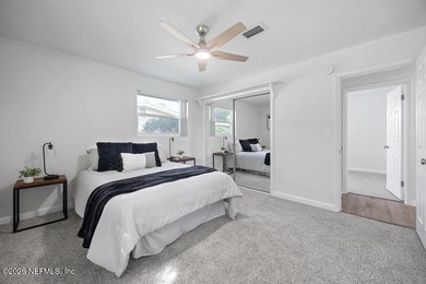 Welcome home to this inviting 3-bedroom, 2-bath pool home - photo 10
