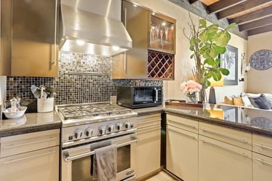This meticulously remodeled loft captures the essence of the - photo 12
