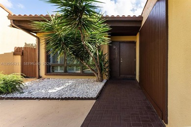 Discover elevated Miami living in this beautifully updated - photo 3