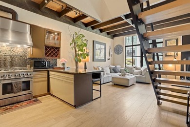 This meticulously remodeled loft captures the essence of the - photo 13