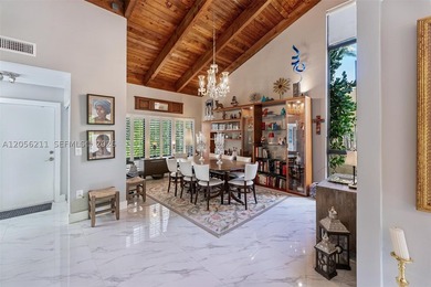 Discover elevated Miami living in this beautifully updated - photo 4