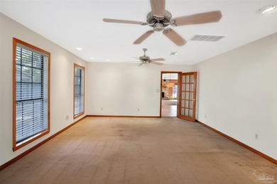 Nestled beneath a canopy of mature trees, this charming - photo 14