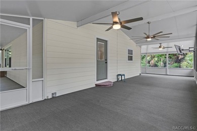 Tucked away on a beautiful wooded 1-acre waterfront lot in the - photo 5