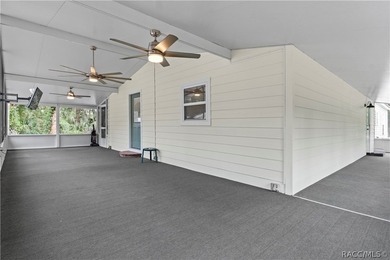 Tucked away on a beautiful wooded 1-acre waterfront lot in the - photo 7