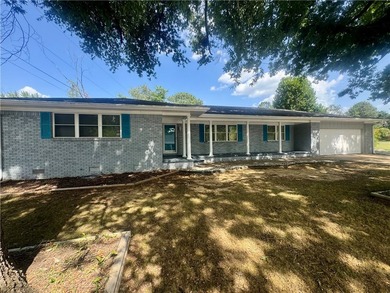 Located in West Russellville, this 4-bedroom, 2.5-bath, 2,589 sq - photo 1