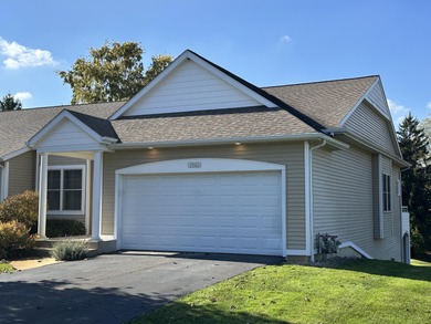 This home overlooks the pristine Lake Michigan Hills Golf Course - photo 2