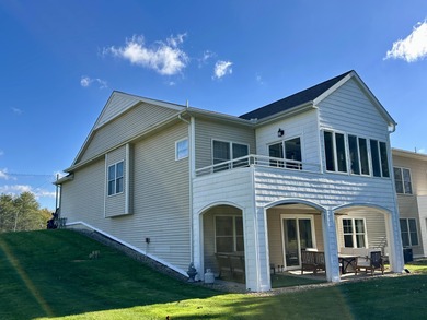 This home overlooks the pristine Lake Michigan Hills Golf Course - photo 3