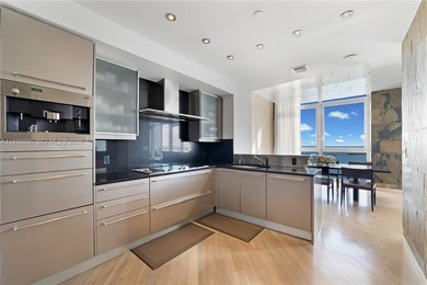 Unobstructed Miami skyline vistas await in this stunning