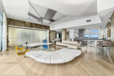 Unobstructed Miami skyline vistas await in this stunning