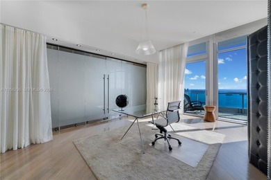 Unobstructed Miami skyline vistas await in this stunning