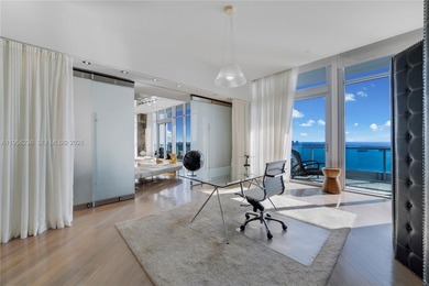 Unobstructed Miami skyline vistas await in this stunning