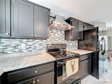 This updated 2-bedroom, 2-bathroom home at 11 Sweetgum Court - photo 7