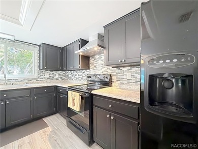 This updated 2-bedroom, 2-bathroom home at 11 Sweetgum Court - photo 8