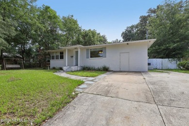 As you enter this well maintained home on a quiet street, the - photo 1