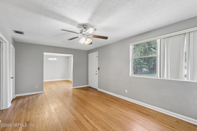 As you enter this well maintained home on a quiet street, the - photo 9