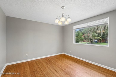 As you enter this well maintained home on a quiet street, the - photo 10
