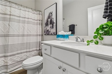 Welcome home to 22 Hidden pointe Drive! This three-story - photo 10