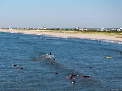 Welcome to 2 Cottage Walk in Gilgo Beach. Scheduled for - photo 1