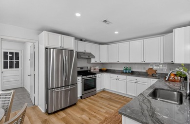 Welcome home to this beautifully updated property located in the - photo 15