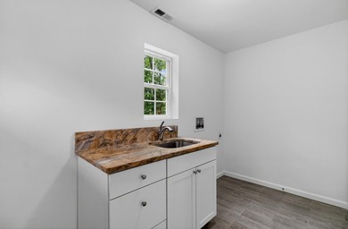 Welcome home to this beautifully updated property located in the - photo 34