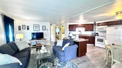 This charming 2-bedroom, 1.5-bath manufactured home offers - photo 3