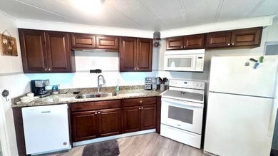 This charming 2-bedroom, 1.5-bath manufactured home offers - photo 5