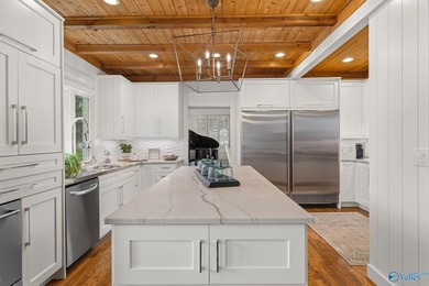 Experience luxury lakefront living in this custom-designed home - photo 20