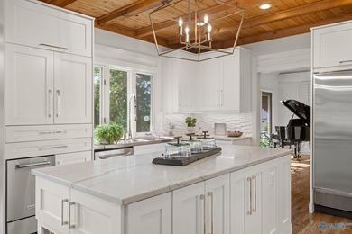 Experience luxury lakefront living in this custom-designed home - photo 21