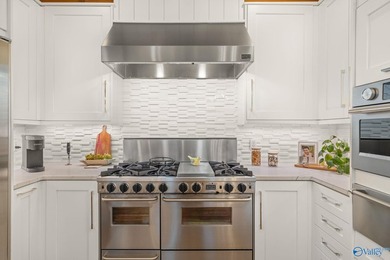 Experience luxury lakefront living in this custom-designed home - photo 24