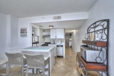 This beautifully updated oceanfront unit offers breathtaking - photo 25