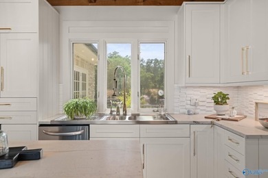 Experience luxury lakefront living in this custom-designed home - photo 25