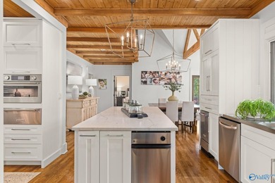 Experience luxury lakefront living in this custom-designed home - photo 26