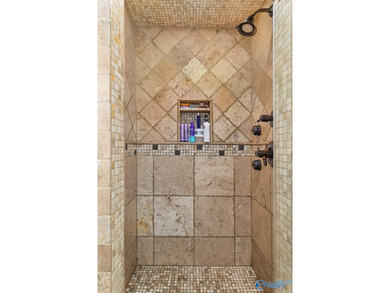 Experience luxury lakefront living in this custom-designed home - photo 38