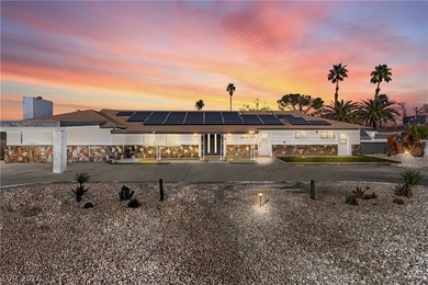 Fully remodeled with high-end finishes throughout, this stunning