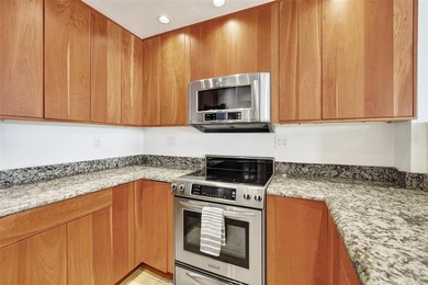 Rarely available 1BR/1.5BA corner unit in the heart of Fort