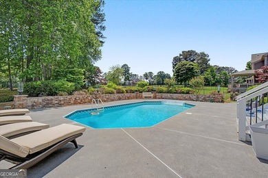 Golf-front Bentwater brick home with a private pool, a three-car - photo 3