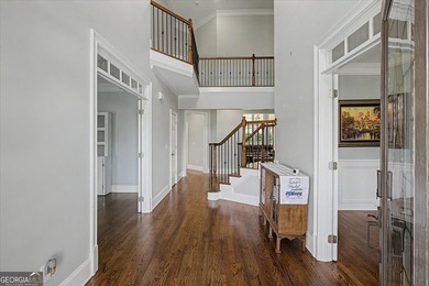 Golf-front Bentwater brick home with a private pool, a three-car - photo 6